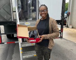  Deborah Lee, CMS custodian, gets free shoes